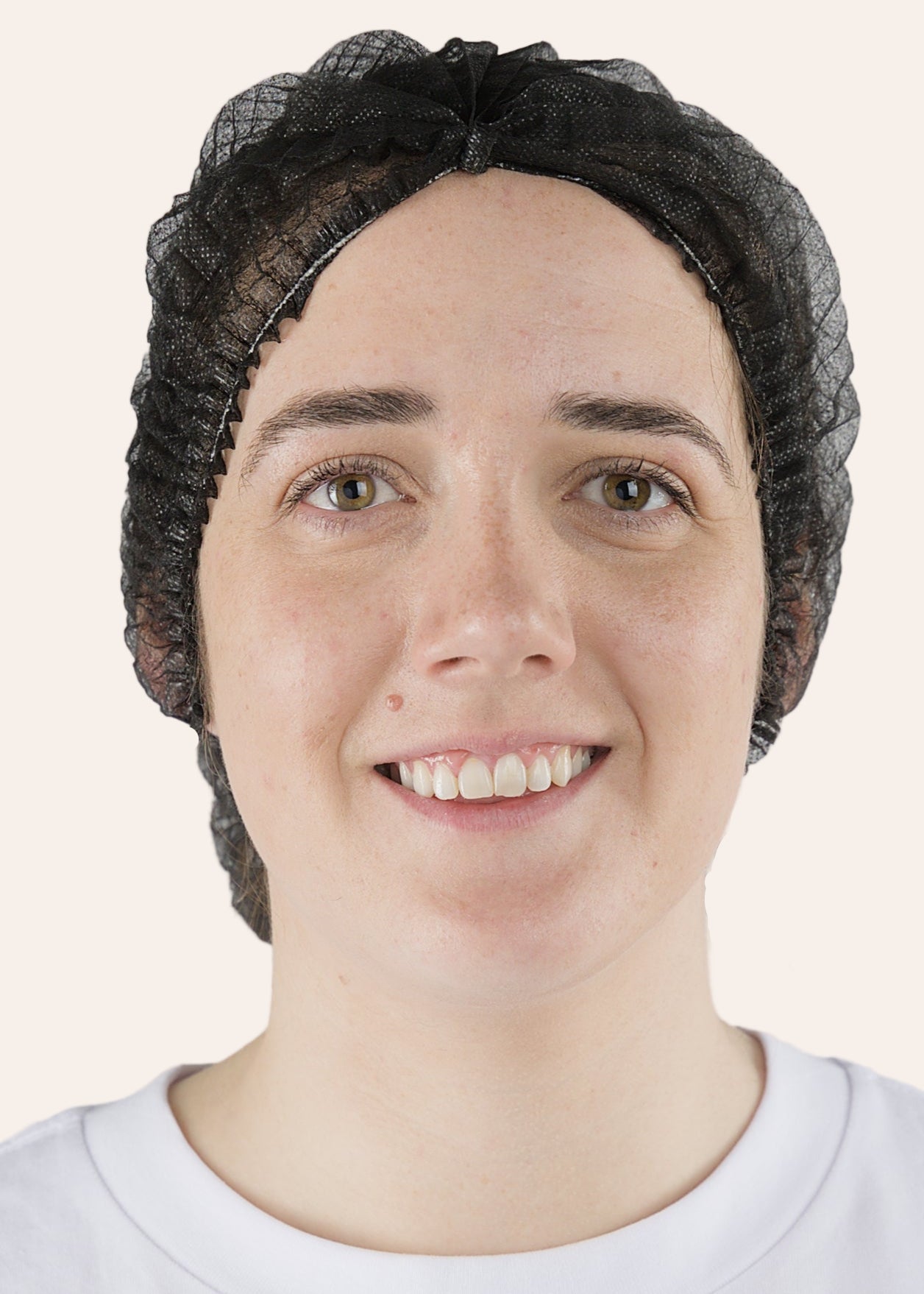 Person wearing black PPE Crimp Hat from IDAS Group Christchurch NZ